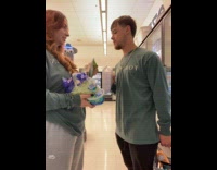 Grocery store robot peeks couple films