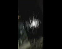 Person pours can of pepsi over windshield window