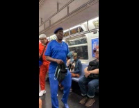 Three old men sing in subway train