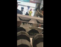 Guy yellow shirt film man lift weights