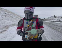 Santa Mandalorian shows Baby Yoda 