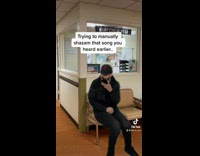 Collab BitchIG2 - Guy black clothes singing into phone