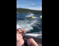 Man and woman tubing bounced off inflatable