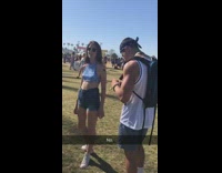 Boyfriend holds girls hand at coachella takes picture