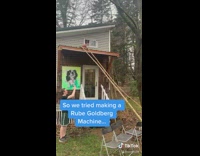 Guy gets hit basketball rube goldberg machine 