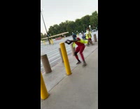 Guy tries to jump over 2 poles 