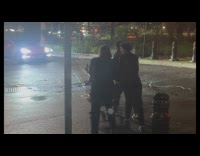 Group filming while pushing and riding shopping cart 