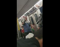 The Jolly Cat runs down aisle and introduces himself to passengers on subway train