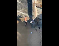 Collab IITW - Man removes top dances by the beach Part 2