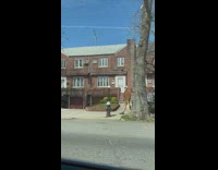 Guy wears brown jacket and striped shorts 