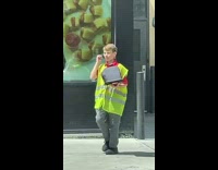 Little boy working drive thru order ipad headset 