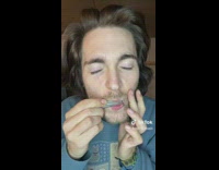 Guy makes sounds and uses a jaw harp 