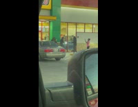 Music video shoot woman rap outside Cefco