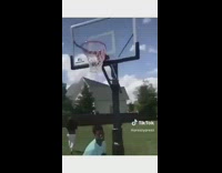 Lady scores basketball point against kid 
