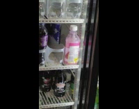 Used pepto bismol bottle in store fridge