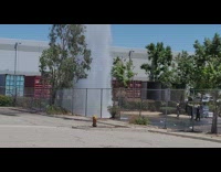 Broken fire hydrant gush out tall water