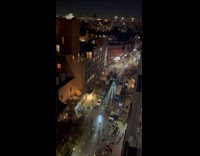 Crowd cheering on street for Libertys win 