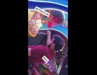 Guy plays whack a mole at arcade 