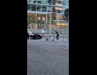 Blonde girl sleeves jacket black car scooter