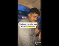 Guy shocks friend with taser in car