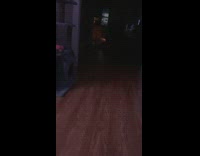 Paper bag gets stuck on cats head 