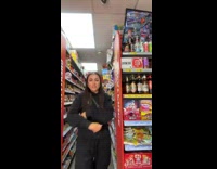 Girl films herself in market walks into customers 