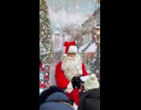 Santa takes photo with pets on grotto part 1