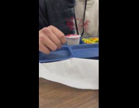 Guy throws pizza across the room