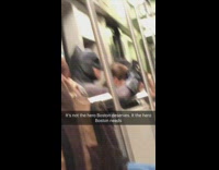 man dressed as batman on subway train