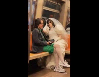 Woman in green dress coat and tie the other in wedding gown part 1 