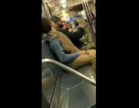 two guys subway train giant lizard reptiles