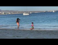 Woman violet green bikini sexy pose beach part 2