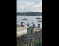 Three women maid outfit dances at docks