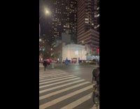 Collab WINY - Person in Christmas Tree Costume Rides Bike