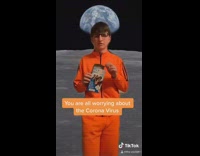 guy orange track suit dance moon
