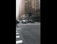 Girl poses outdoors high rise buildings Verizon