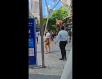 Man and Woman tiktok dance outside mall