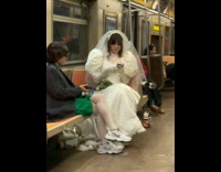 Woman in green dress coat and tie the other in wedding gown part 2