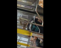 Guy cuts hair with black scissors train 