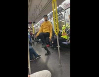 Dancer on train smashes head on ceiling while dancing