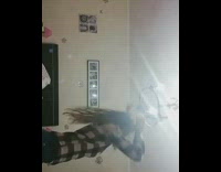 Dancing girl gets hair stuck to ceiling lamp