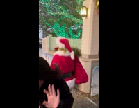 Man greeting The Grinch Merry Christmas 