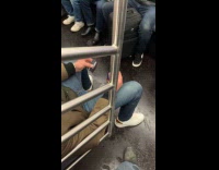 Man flips credit cards while riding subway