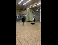 Old man interpretative dance with violinist performing