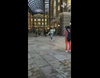 Woman green sweater tiktok dance black gate