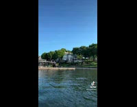 Collab Clips mpugc - Woman on lake looks at huge houses