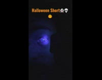 Blue light pointed at the eyes and face of the filmer