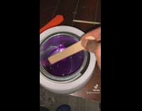 Girl puts wax on boyfriends leg hairs 