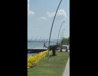 Woman white shirt tiktok dance boat dock 