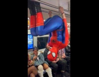 Collab Subway_Creatures - Woman Spider-Man costume hangs on train handrail